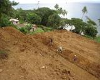 FIJI property View from upper terrace, showing main level and distance to neighbor and view of bay